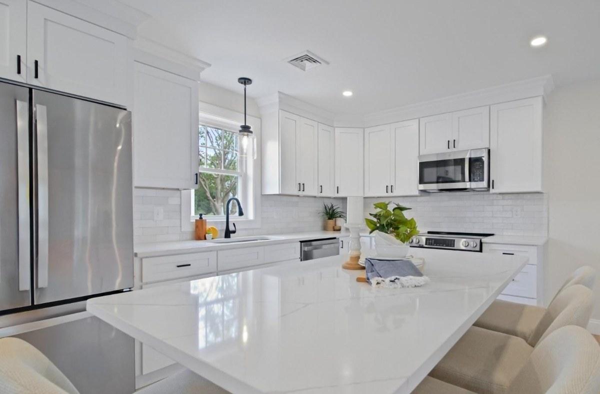 Gallery Green kitchen with quartz island
